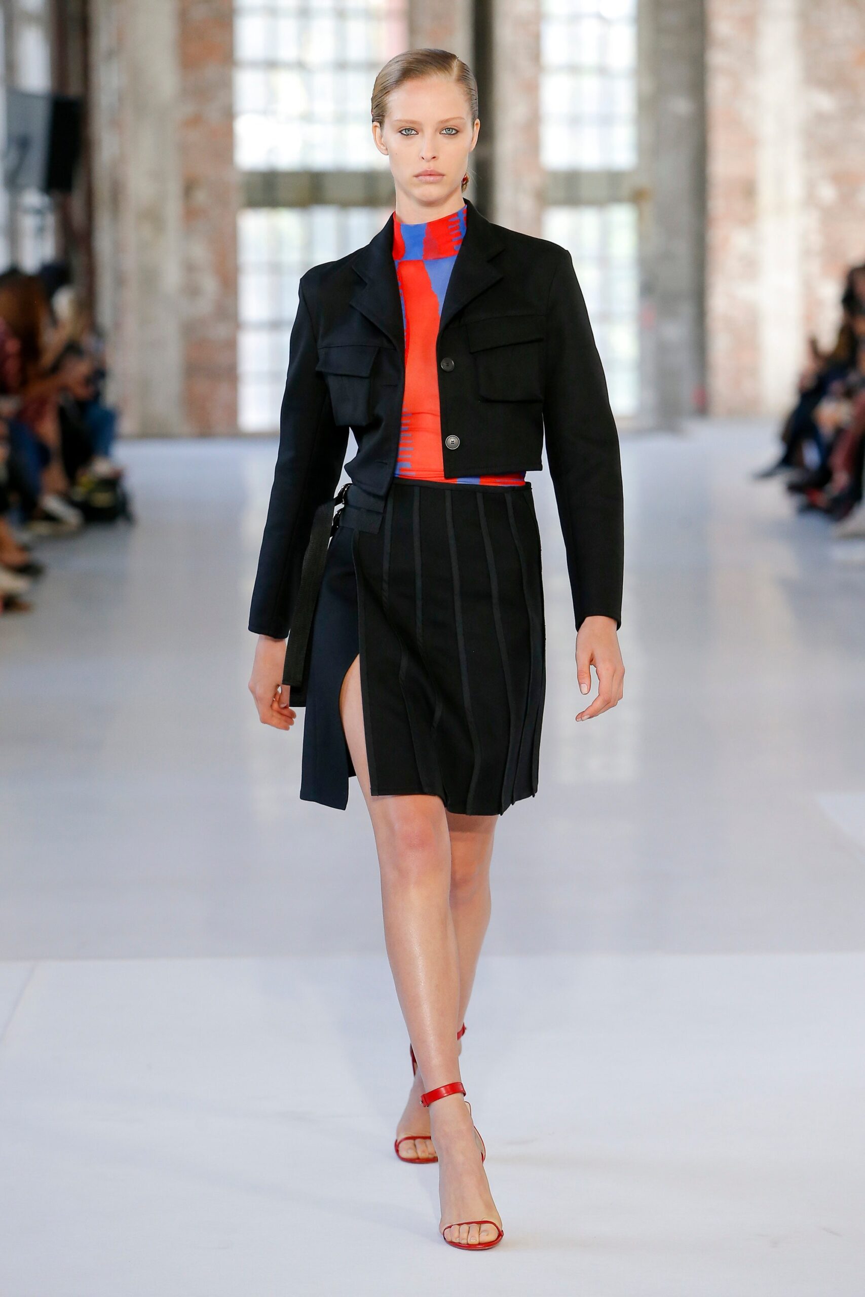 black jacket red blue top