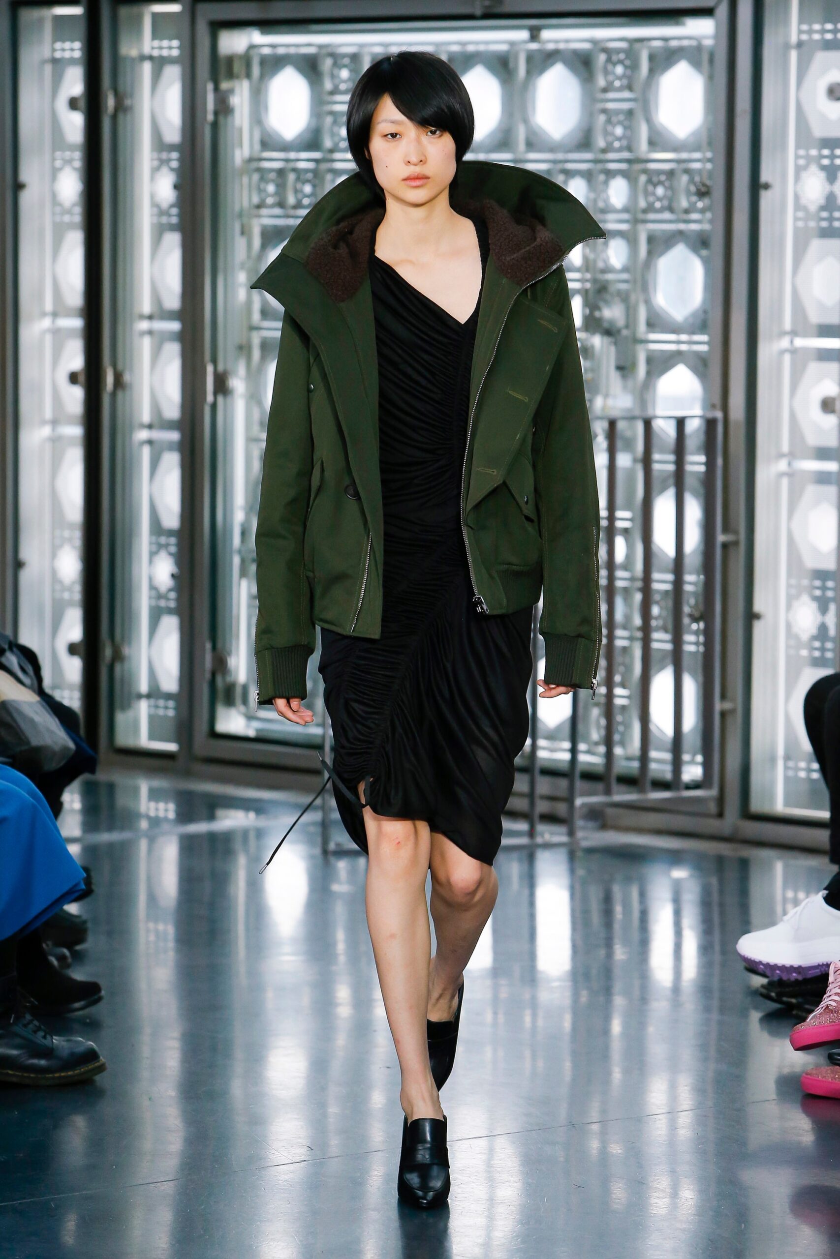black ruched midi dress with green jacket