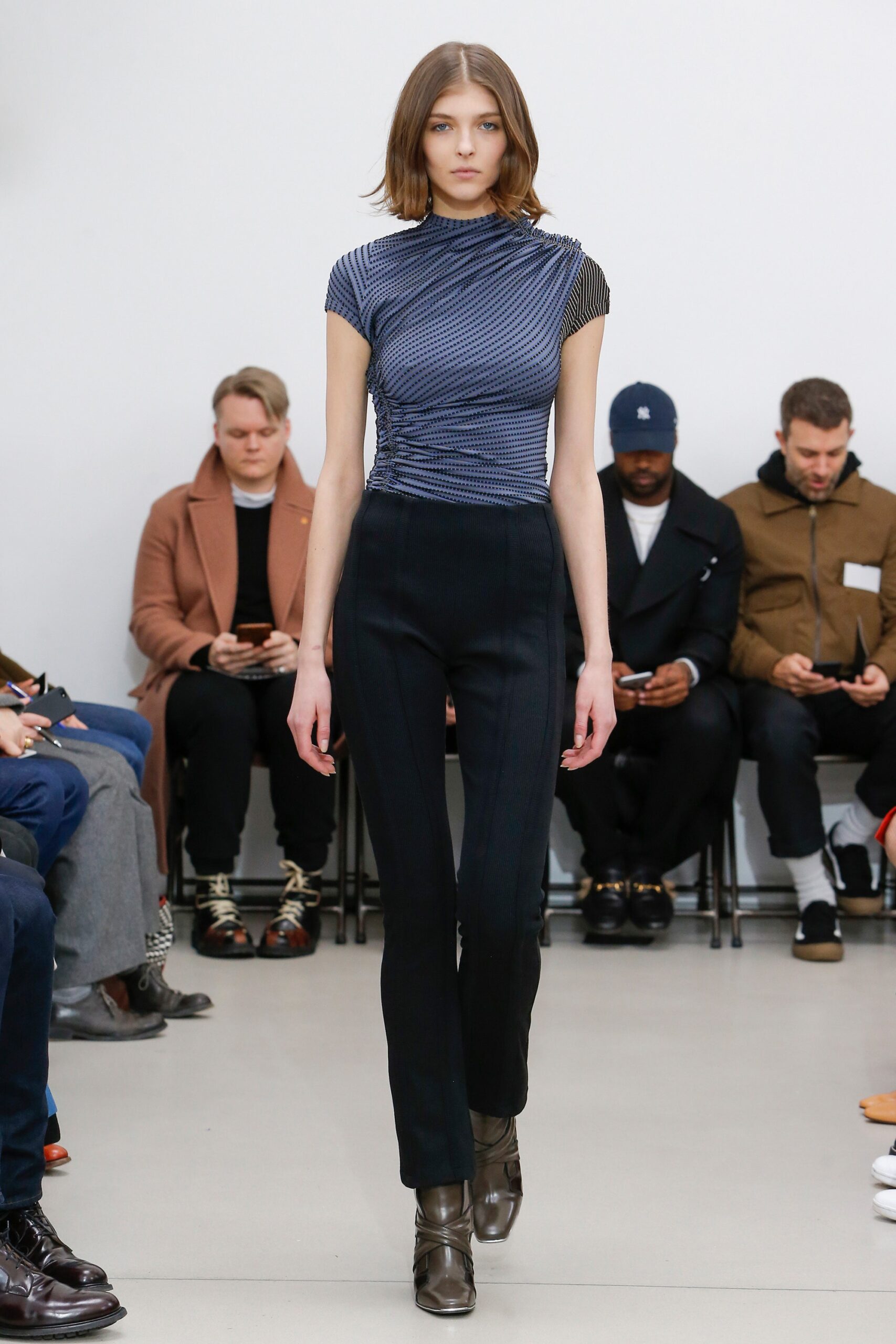 fitted blue striped top with slim black pants