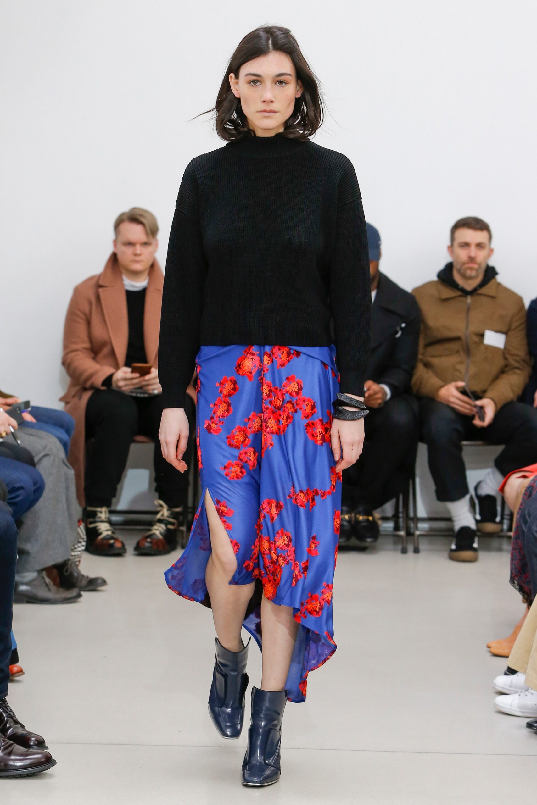 black wool top with blue skirt