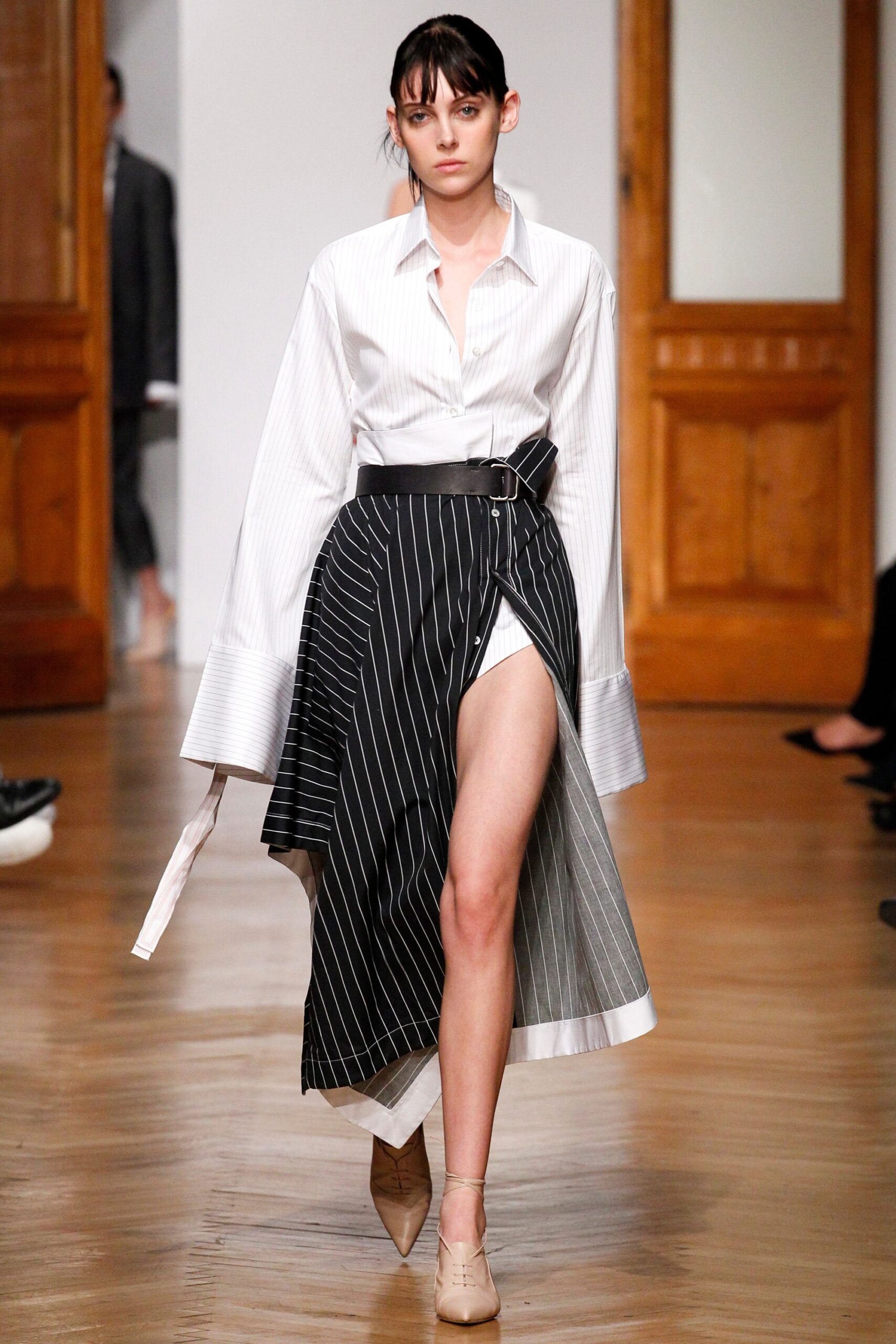 white relaxed shirt with black skirt