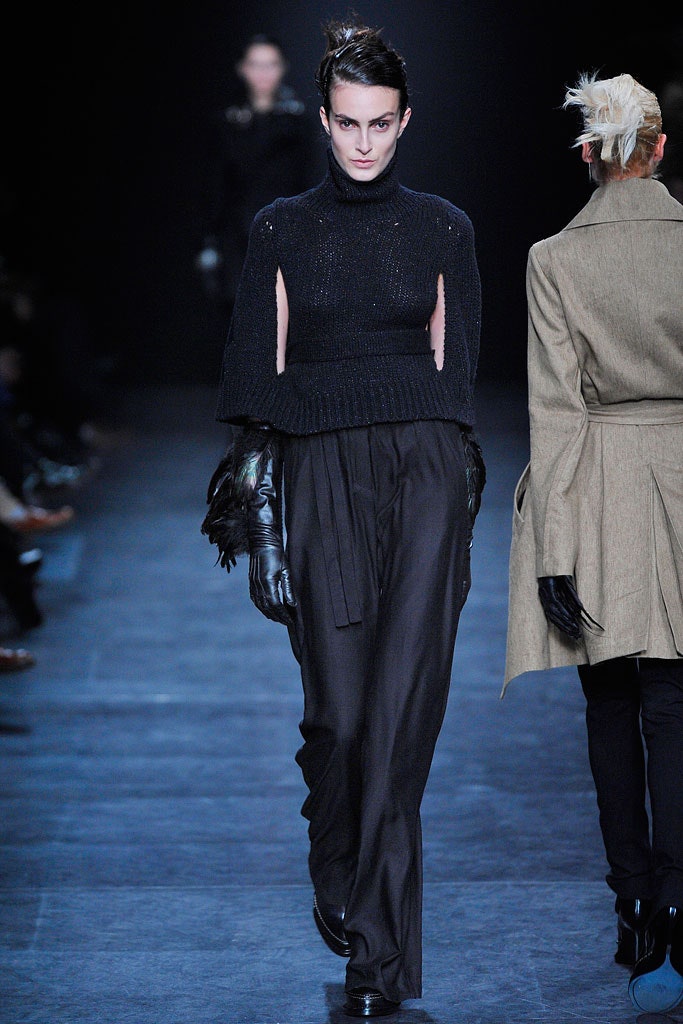 black fitted top and relaxed pants