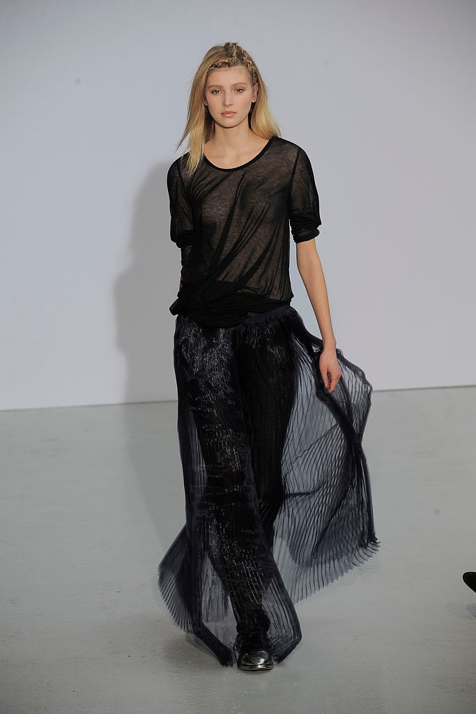 black mesh top and pleated skirt