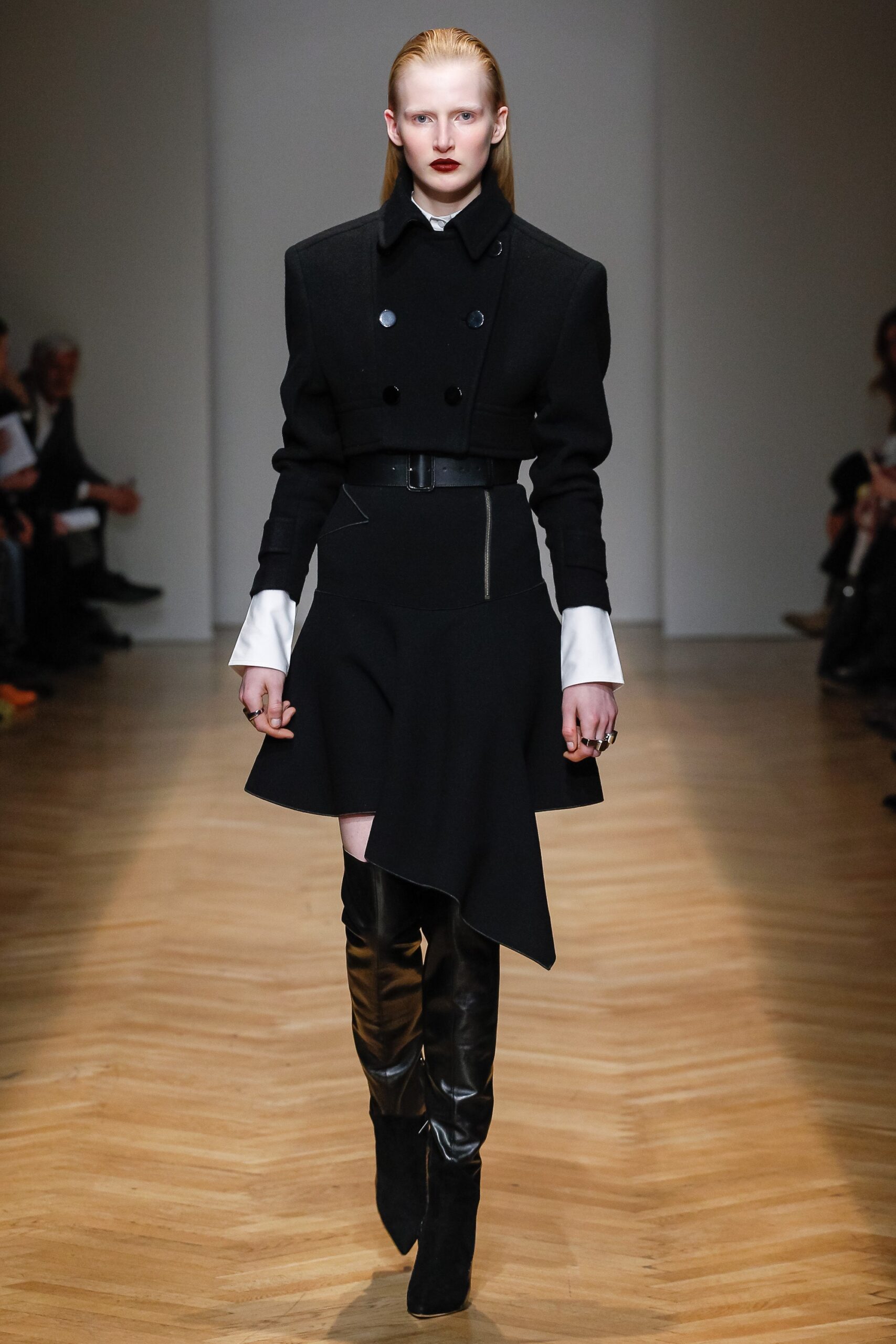black leather fitted shiny boots