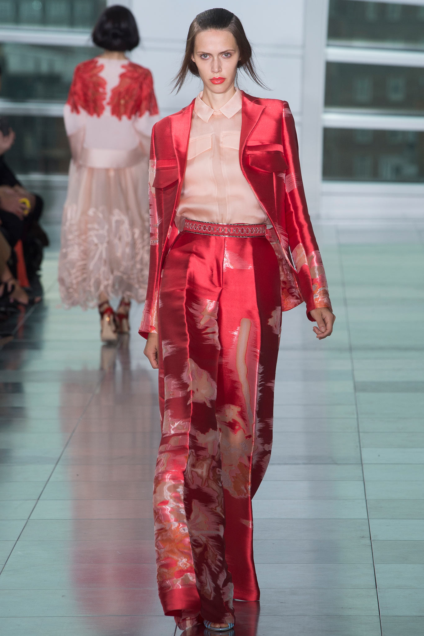 red silk long-sleeve collared fitted flared shiny suit