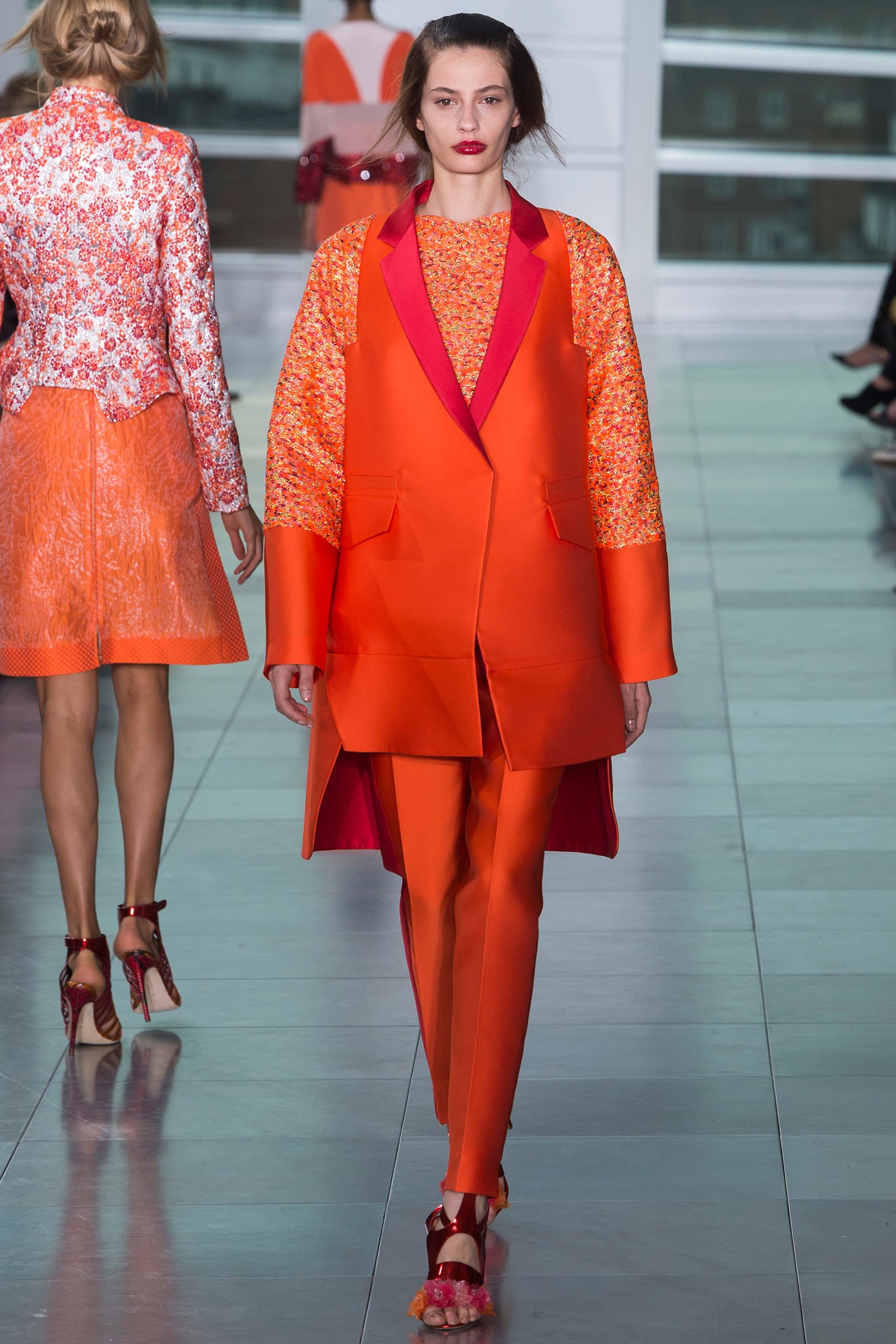 orange tailored suit with floral top