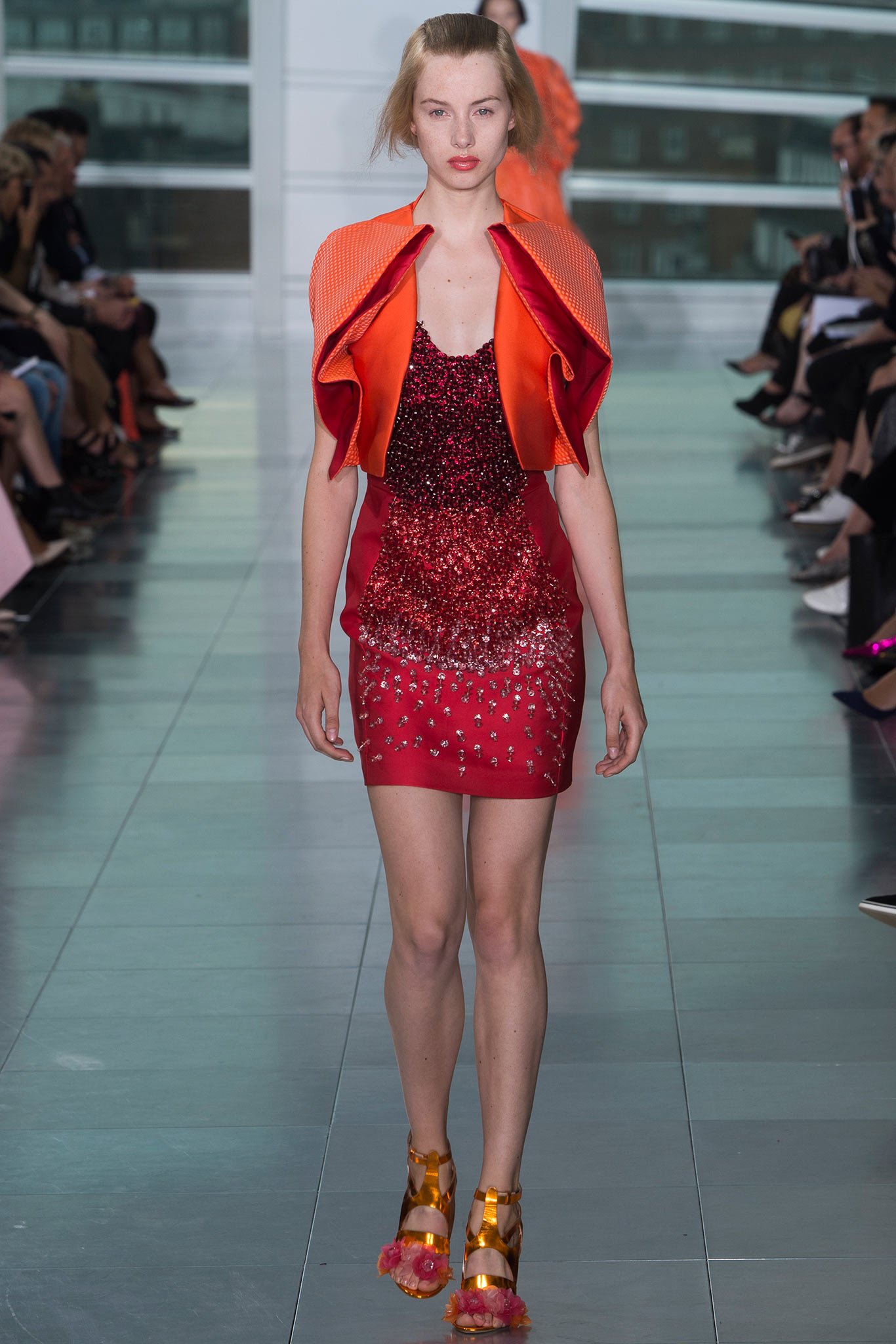 red sequined mini dress with orange cape