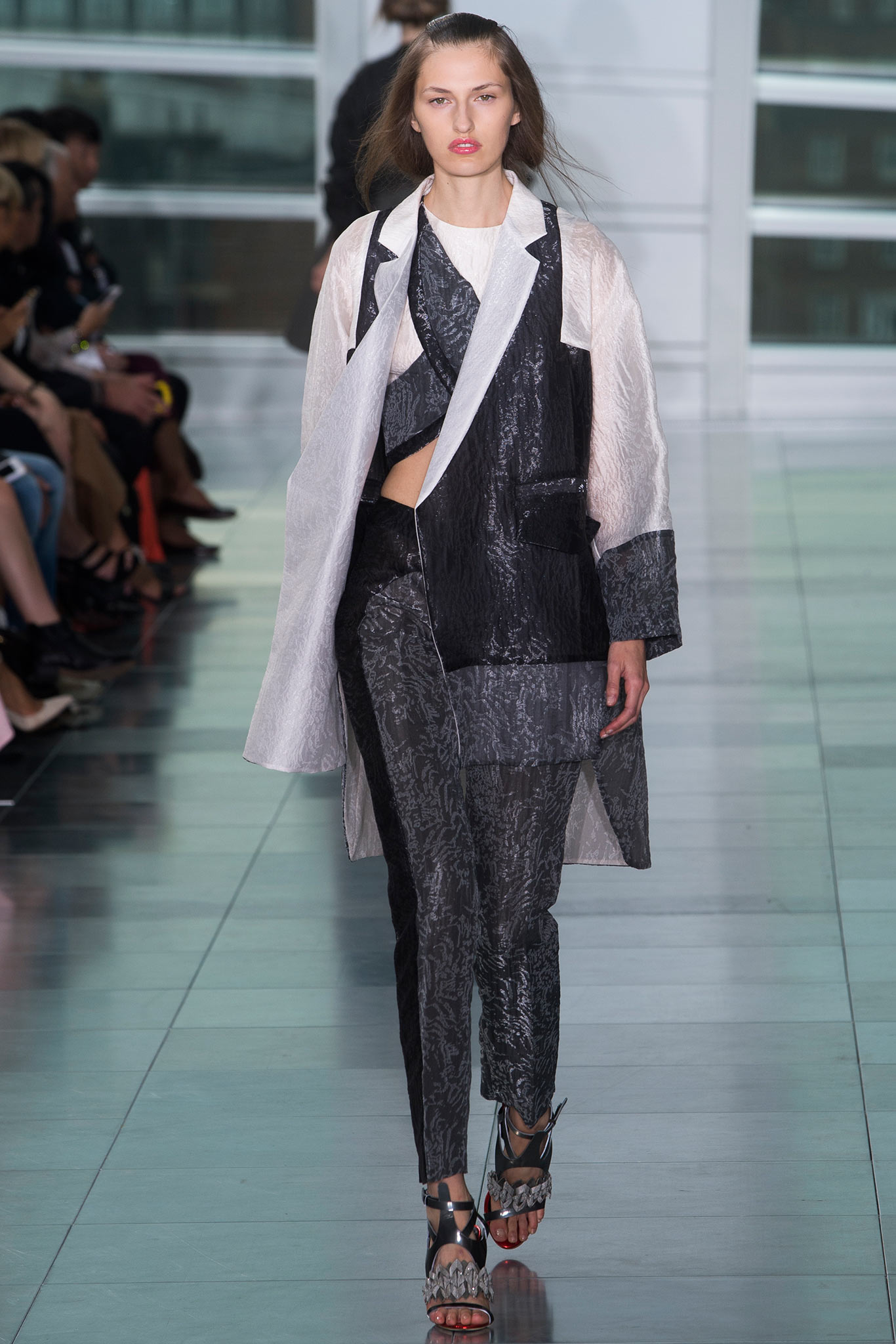 black and white silk coat with fitted pants