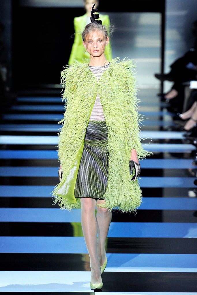 green fur coat with black skirt