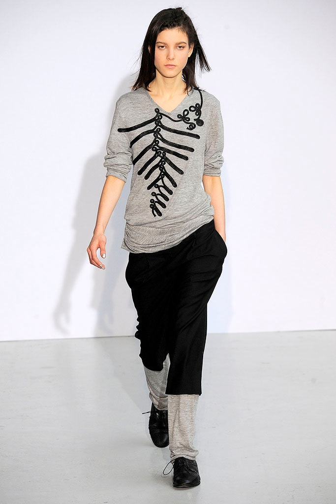 gray relaxed top with black pants