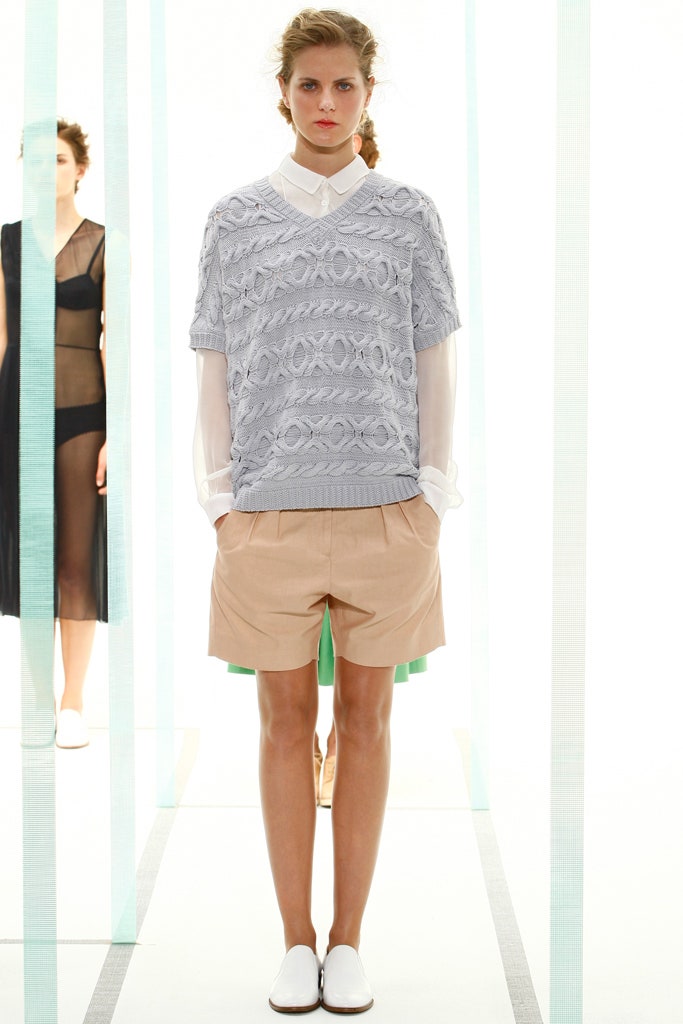 gray knit top and beige shorts