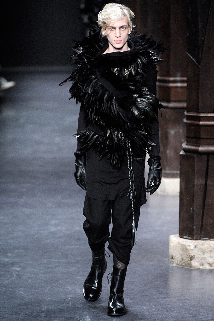black feathered top with relaxed pants