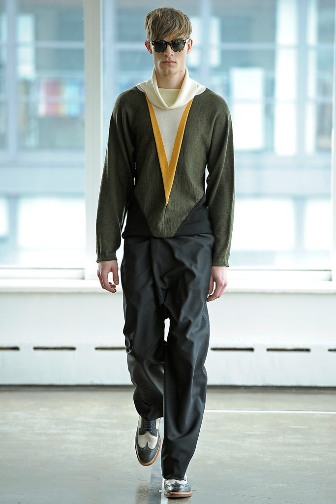 green v-neck top with relaxed pants