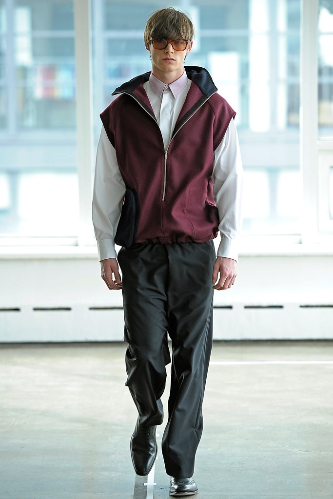 maroon hooded jacket with black pants
