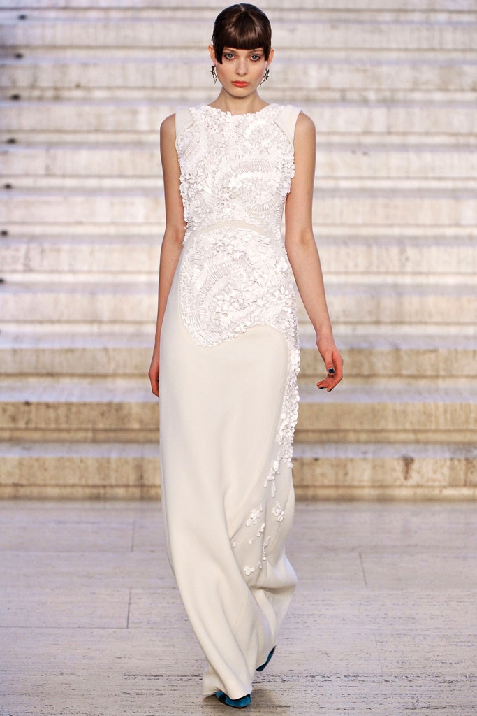 white embroidered sleeveless gown