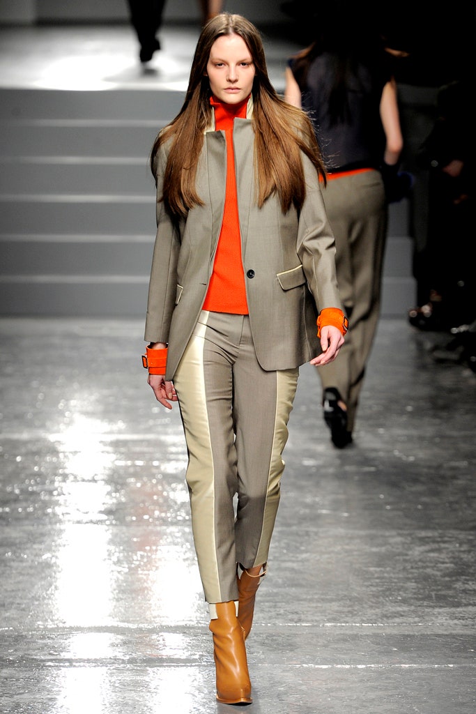 gray tailored blazer with orange top