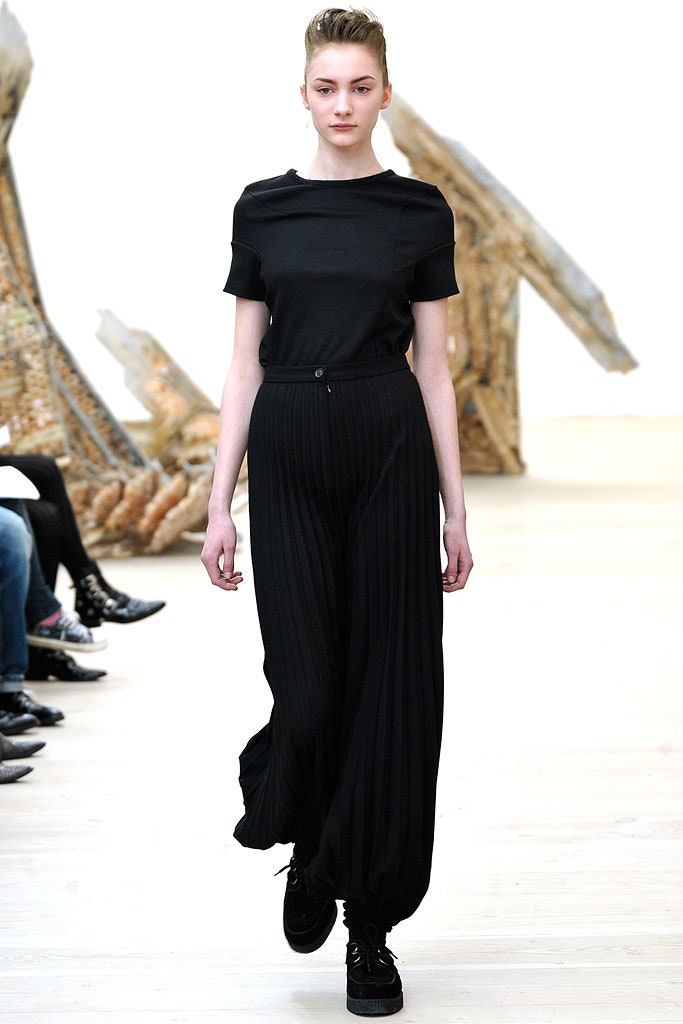 black fitted top and relaxed pants