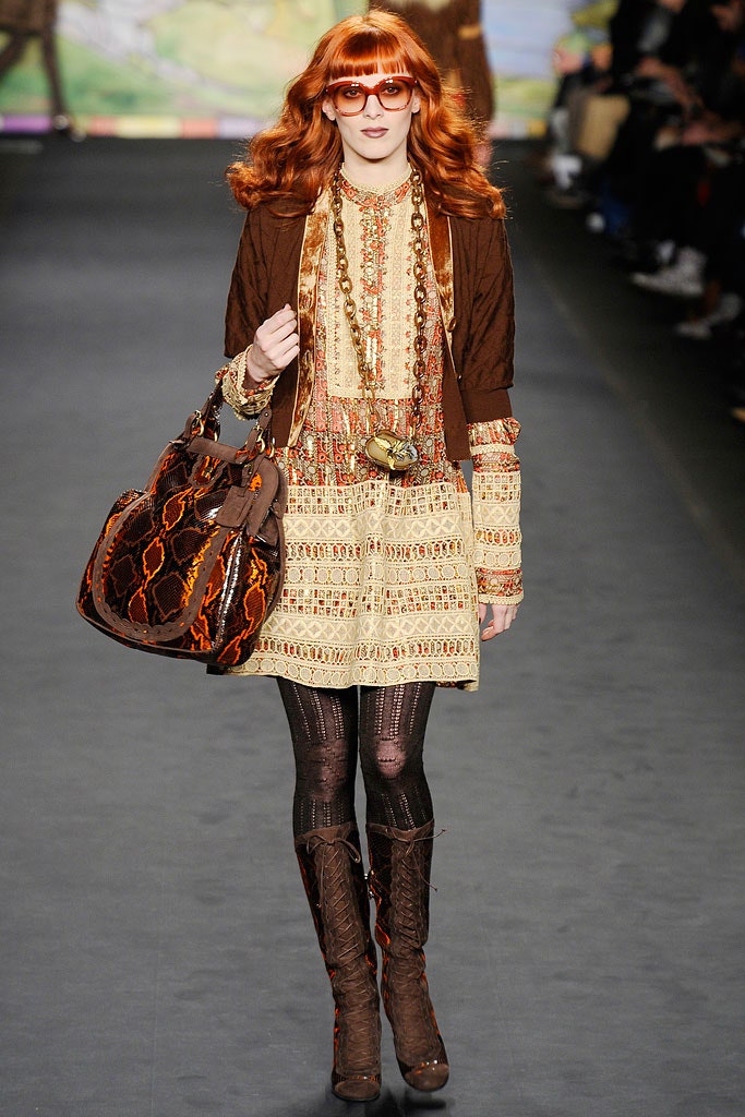 beige embroidered mini dress with brown jacket