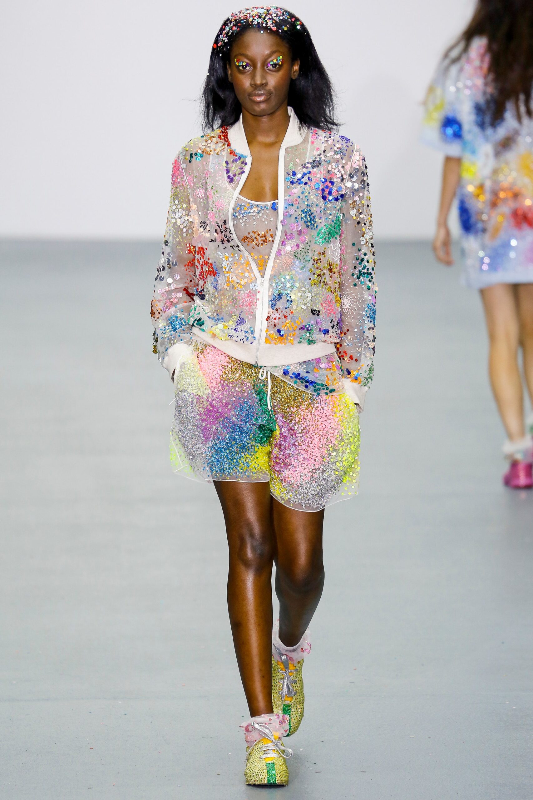 multi-colored mesh jacket and shorts