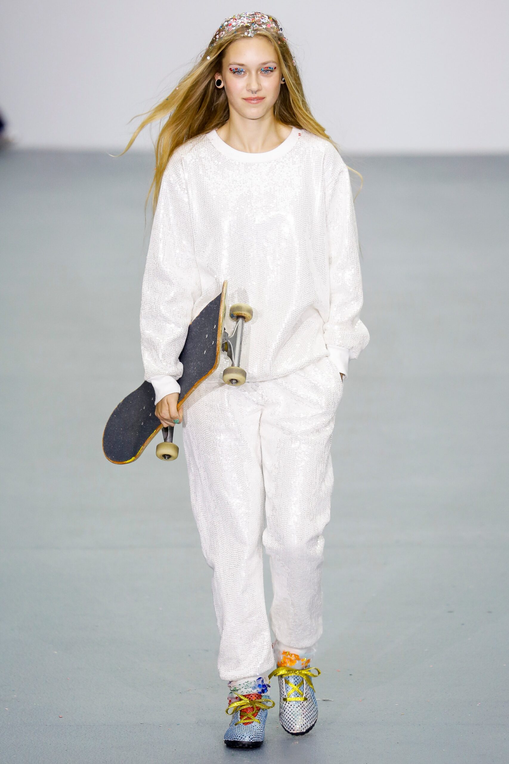 white cotton long-sleeve relaxed zippered shiny pants