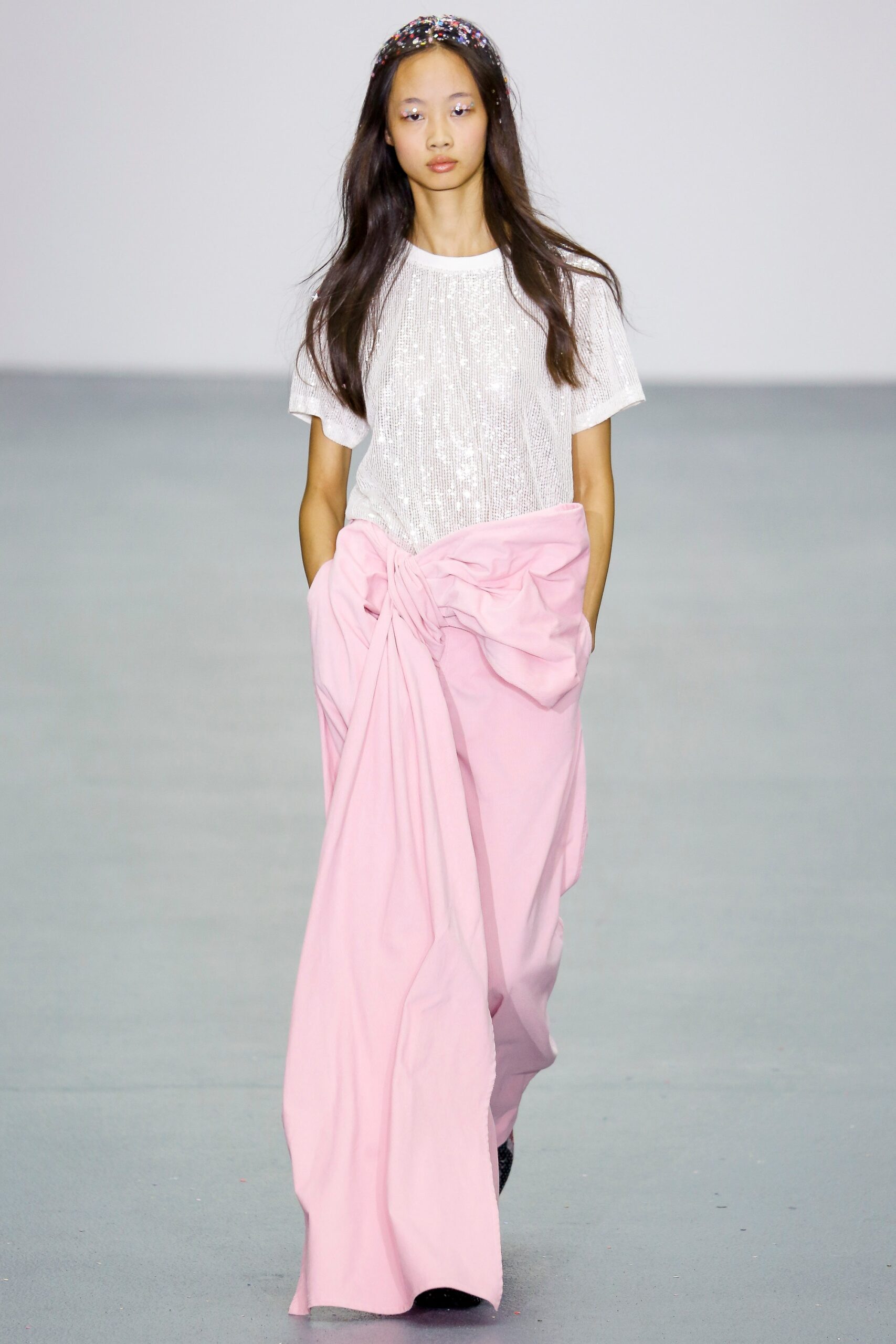 white sequined top and pink draped skirt