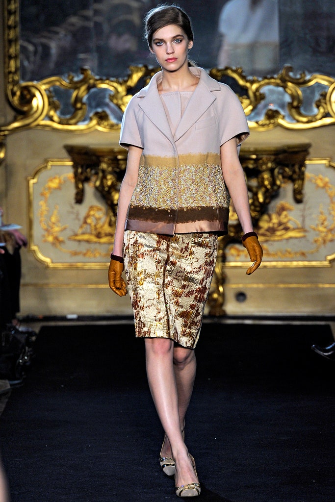 beige silk blouse with gold skirt