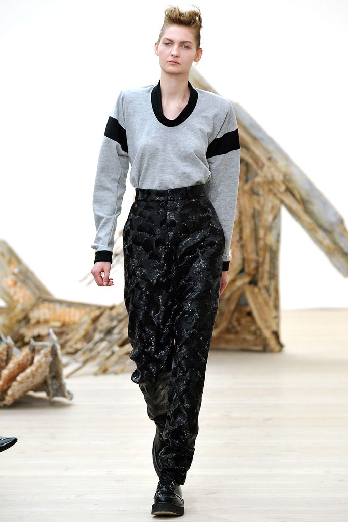 gray relaxed top with black pants