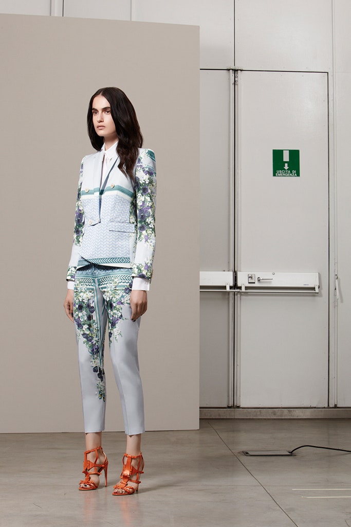 blue silk fitted top with gray pants