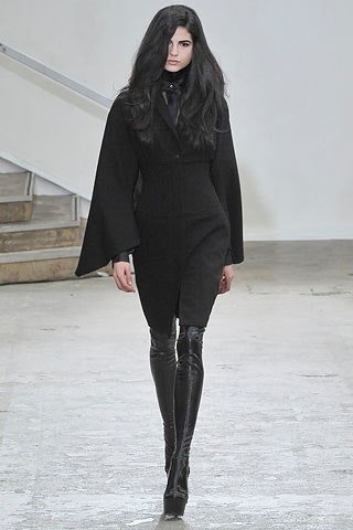 black wool sleeveless collared fitted draped cape