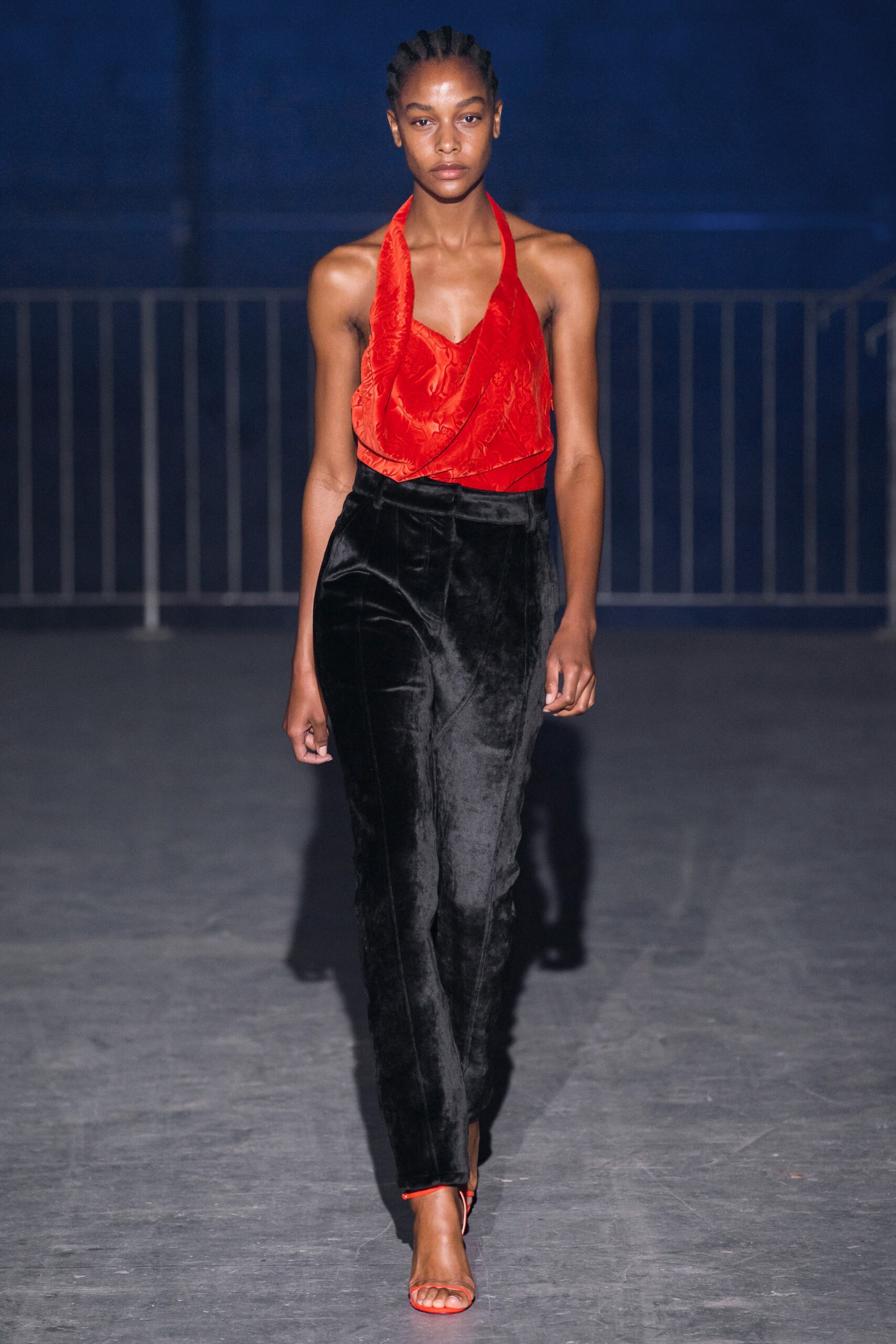 red silk halter top with black velvet pants