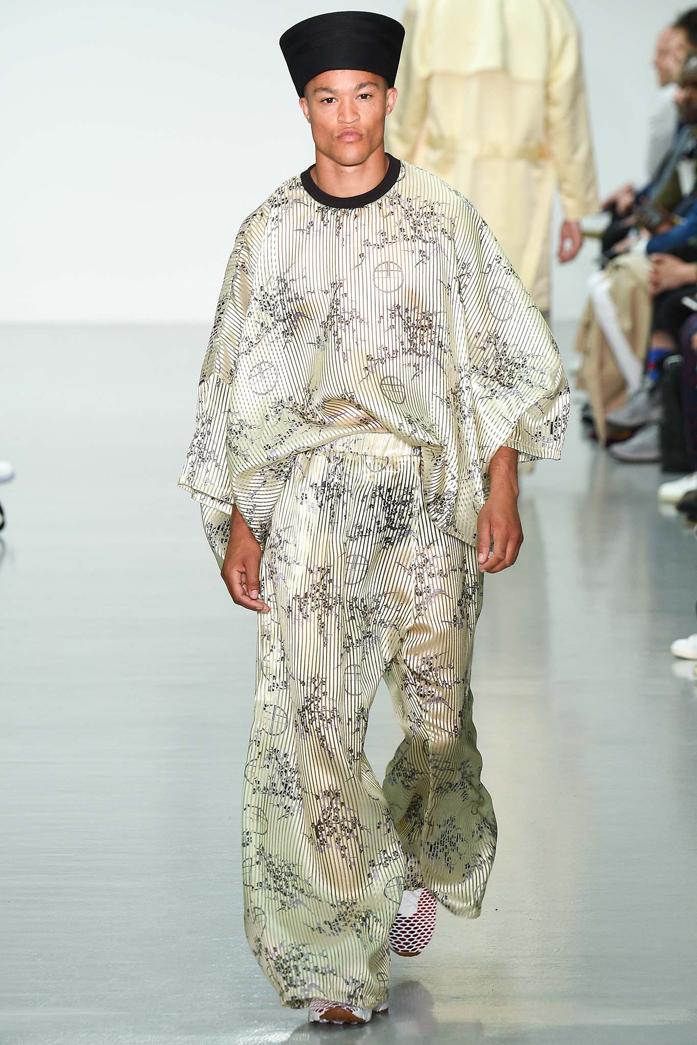 beige and black printed silk outfit