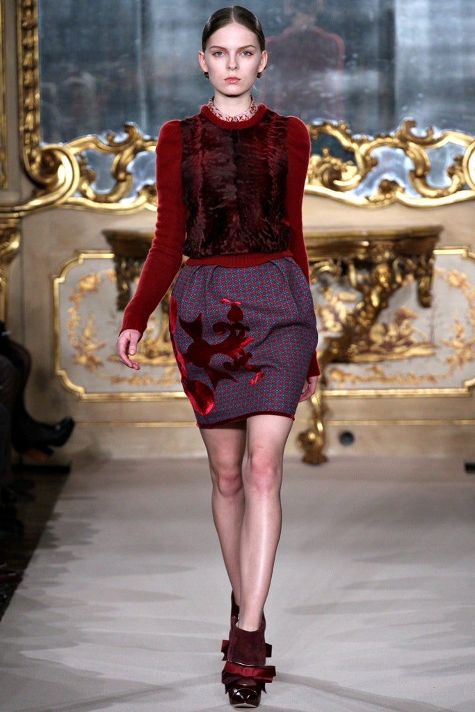 red fur top and blue pencil skirt