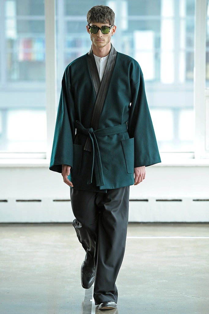 green wool relaxed jacket with black pants