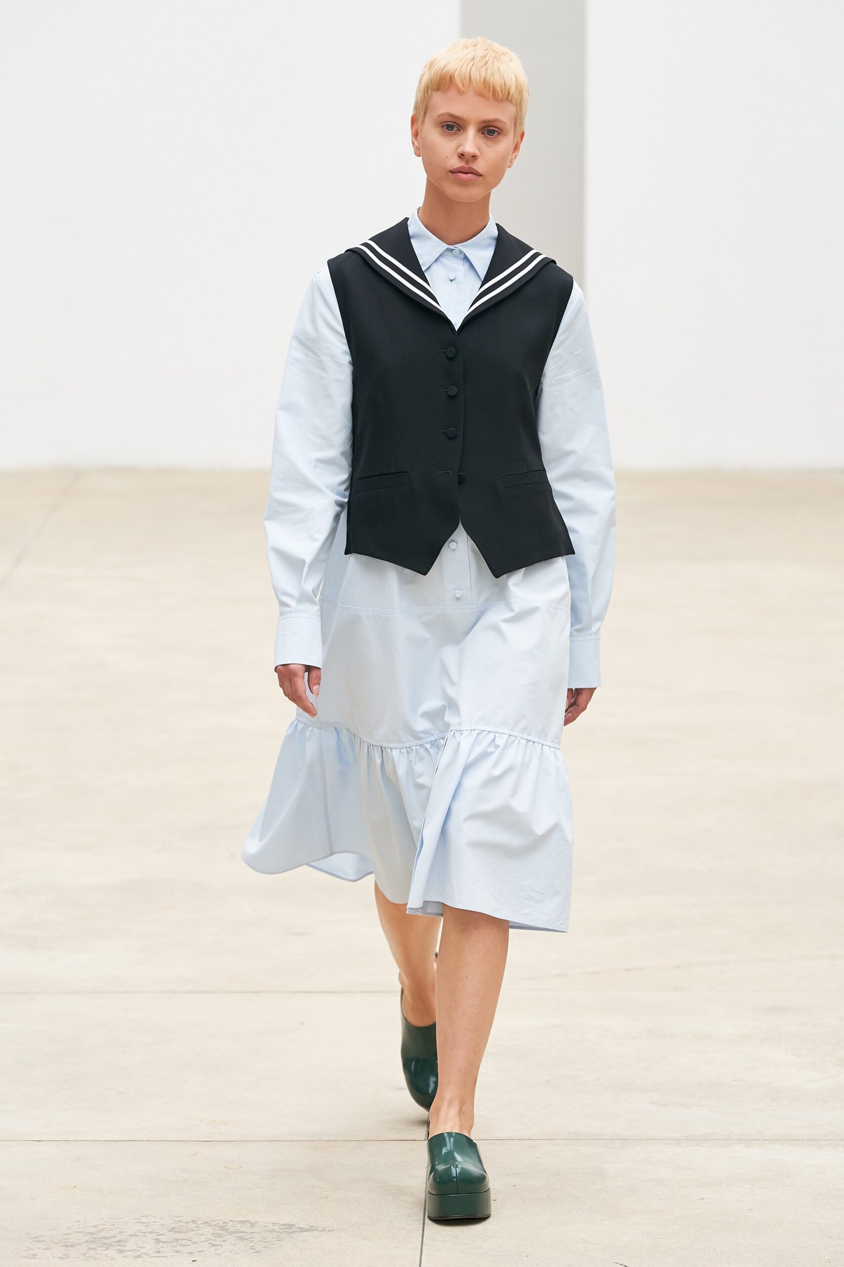 black vest light blue dress