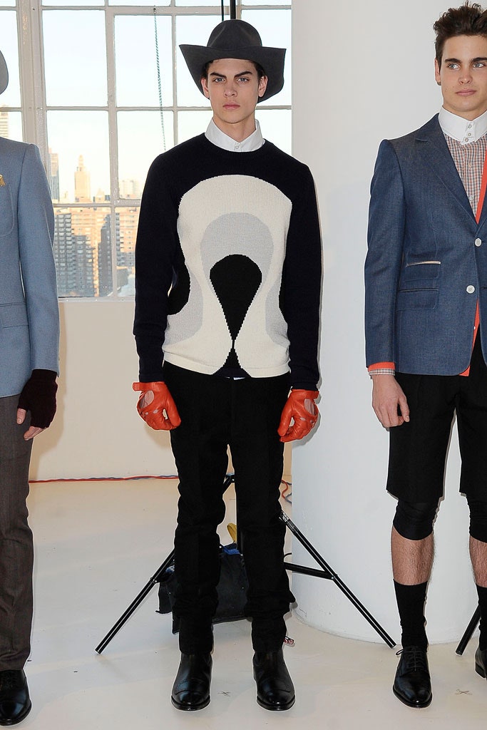 black wool long-sleeve high-neck fitted draped sweater