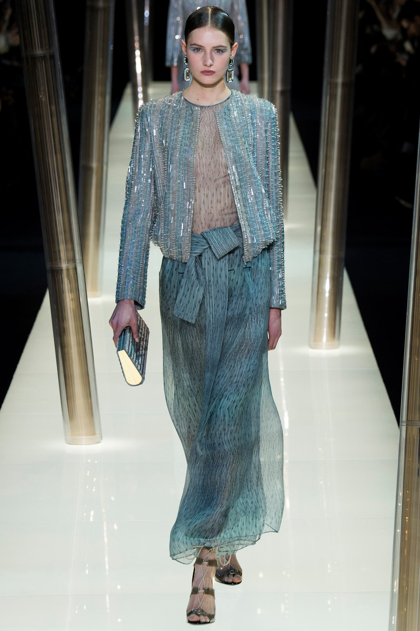 blue sequined jacket and flowing dress