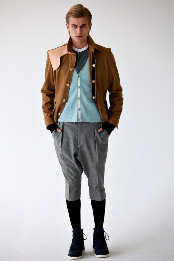 brown jacket with blue vest