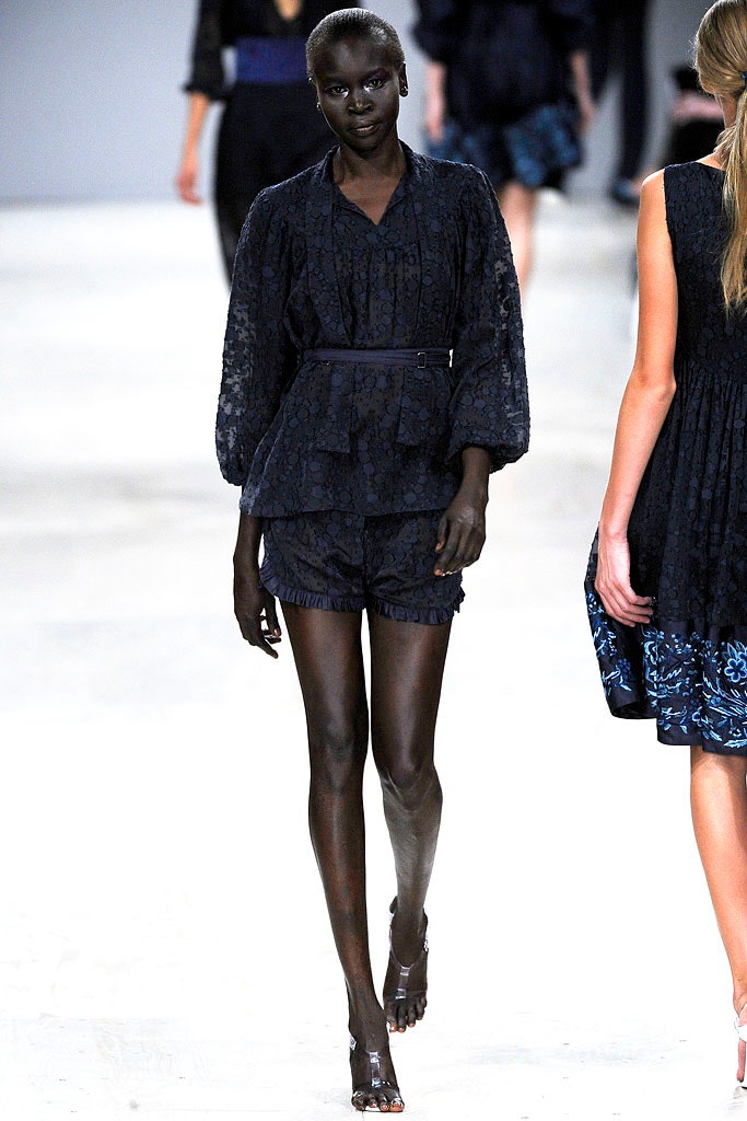 black fitted long-sleeve romper