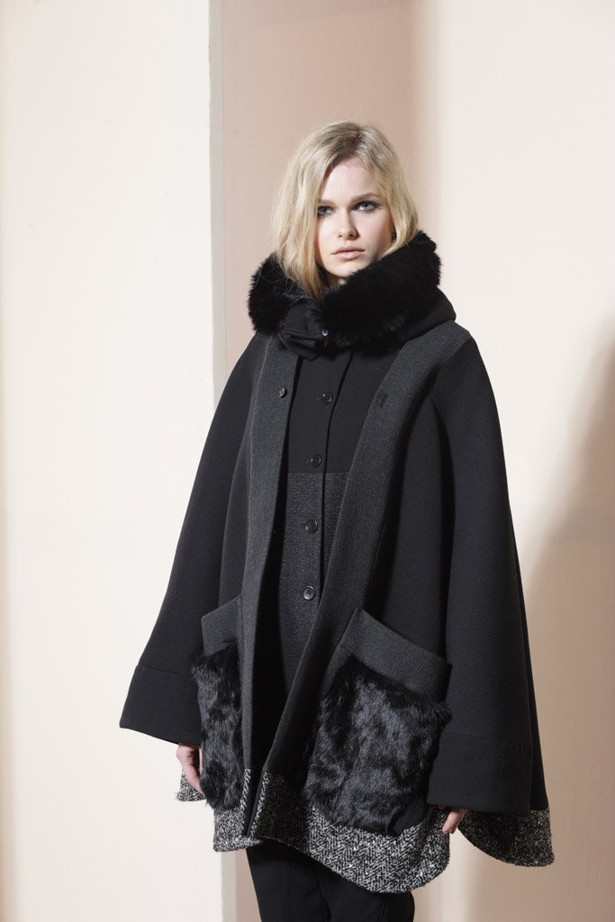black wool cape and fitted dress