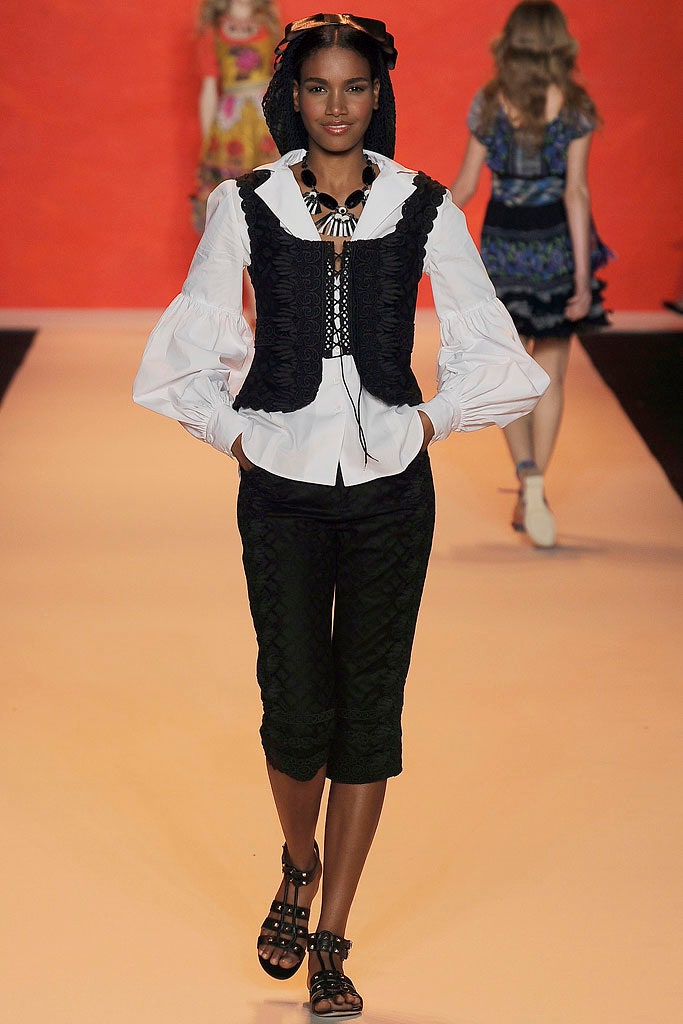 black fitted vest with white shirt