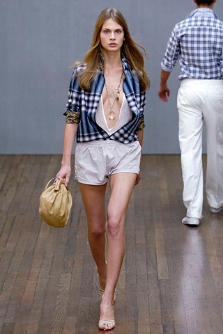 blue checked shirt with beige shorts