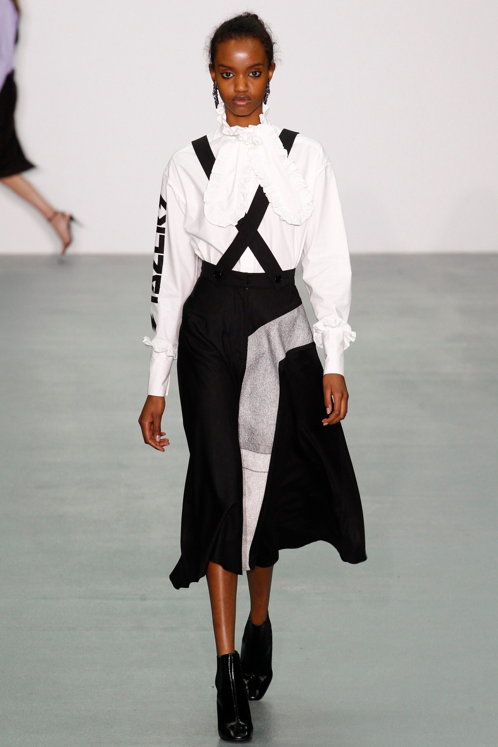 white fitted shirt and black skirt