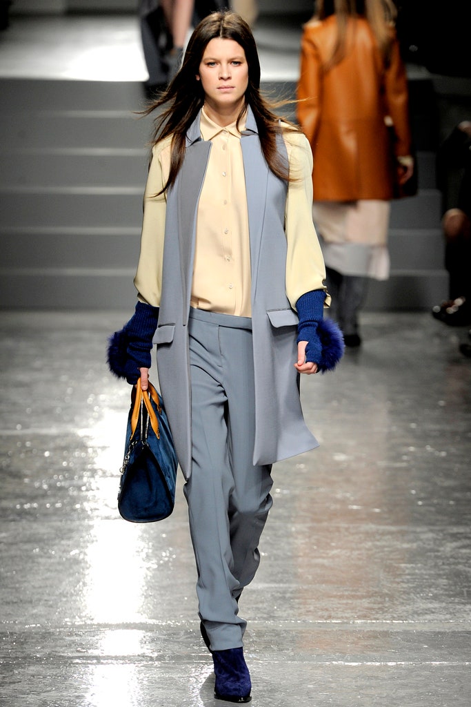 beige blouse blue jacket tailored pants
