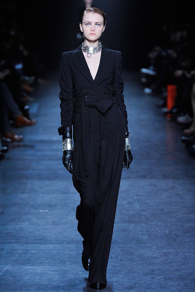 black fitted jumpsuit with gloves