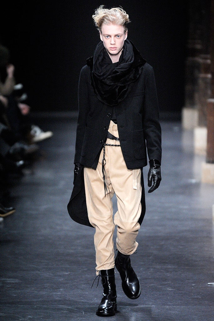 black wool coat with beige pants