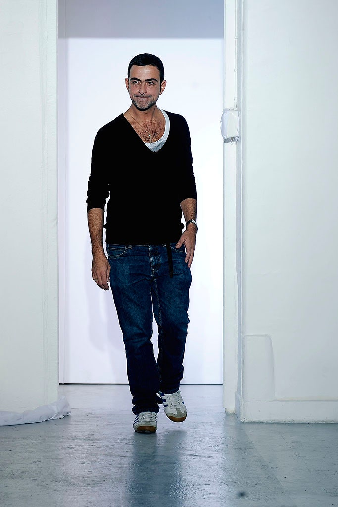 black sweater blue jeans