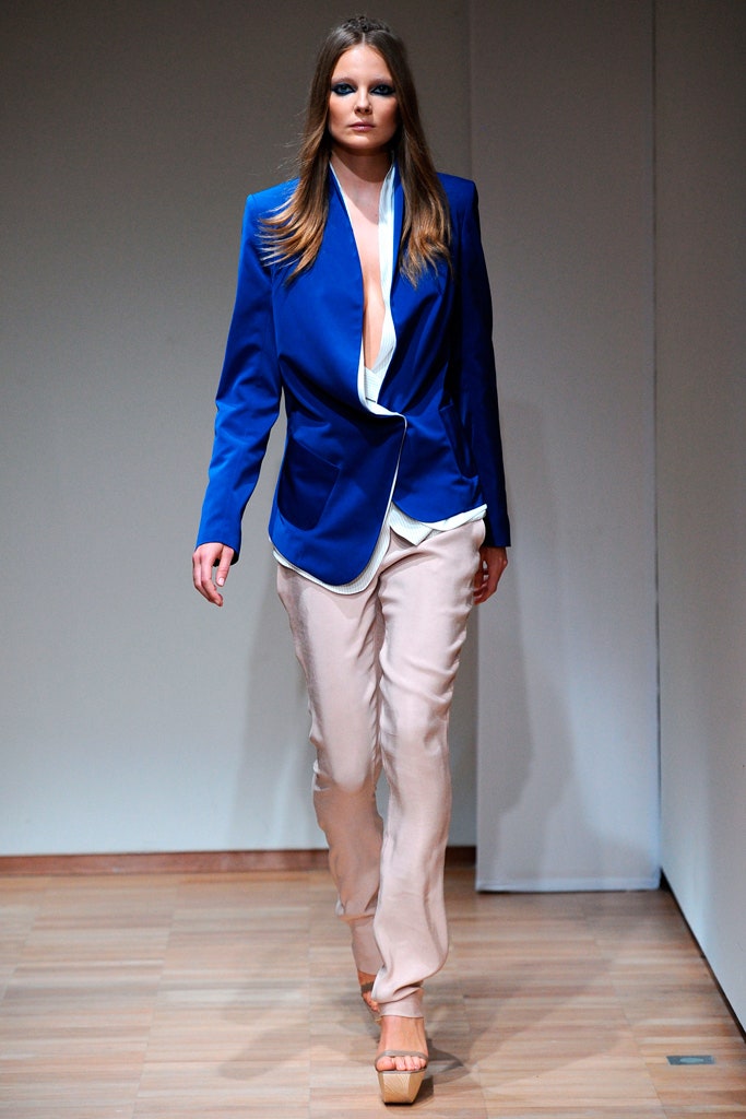 blue tailored blazer with beige pants