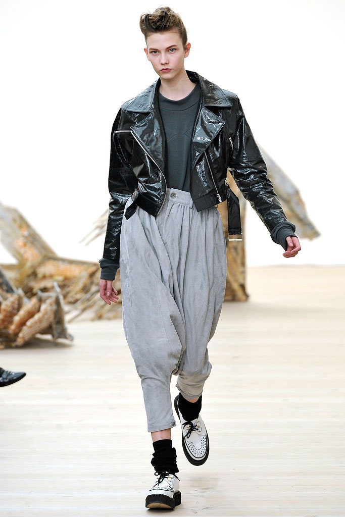 black vinyl jacket gray top and pants