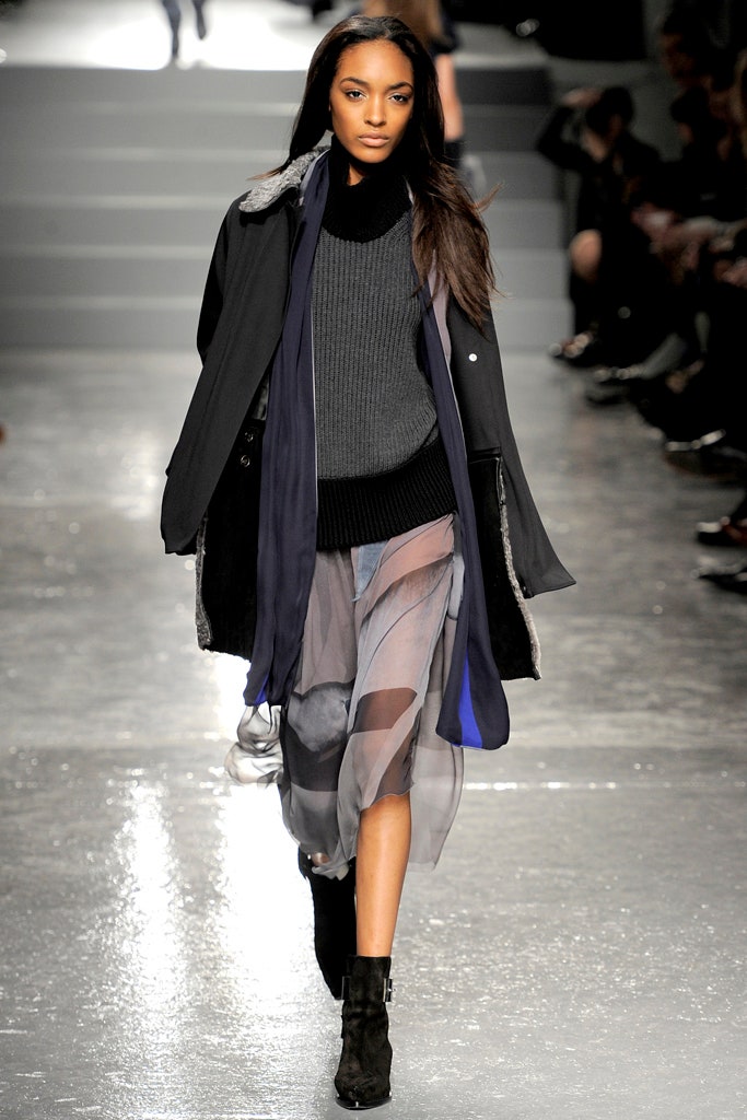 black coat gray sweater layered skirt