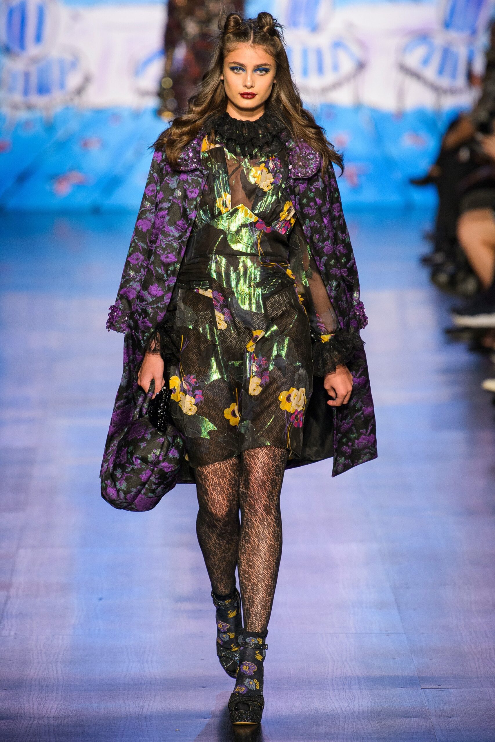 black mini dress with purple cape